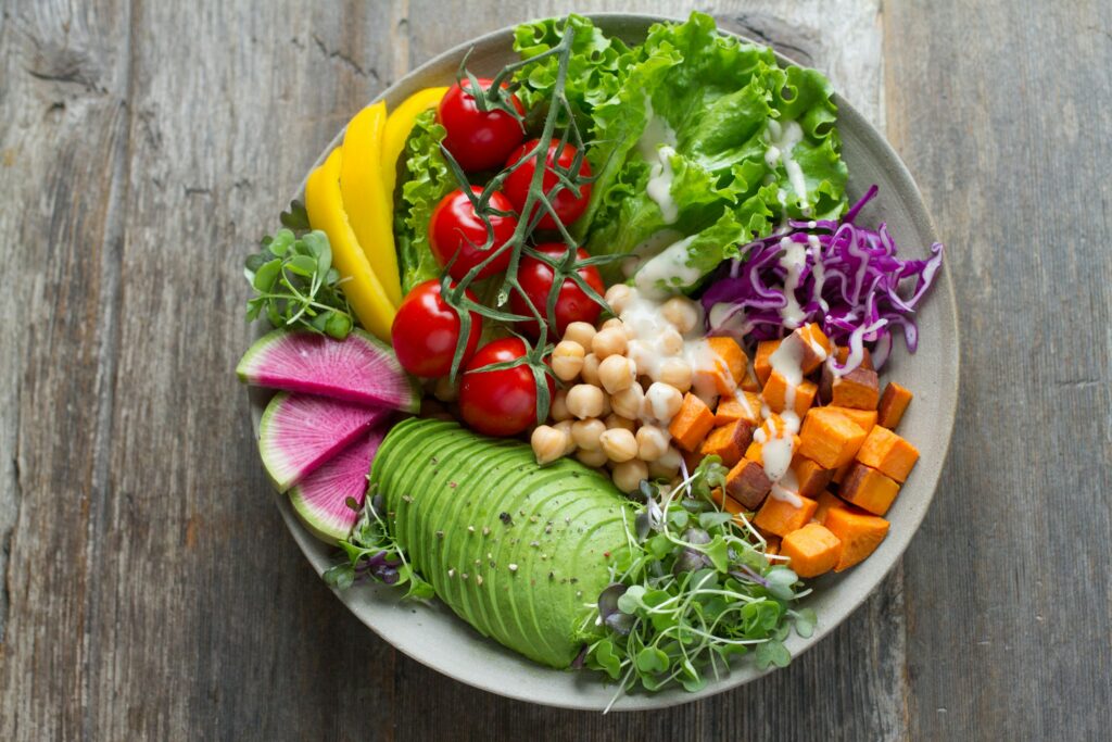 Blood pressure diet: a healthy bowl of fresh vegetable salads on a clean table