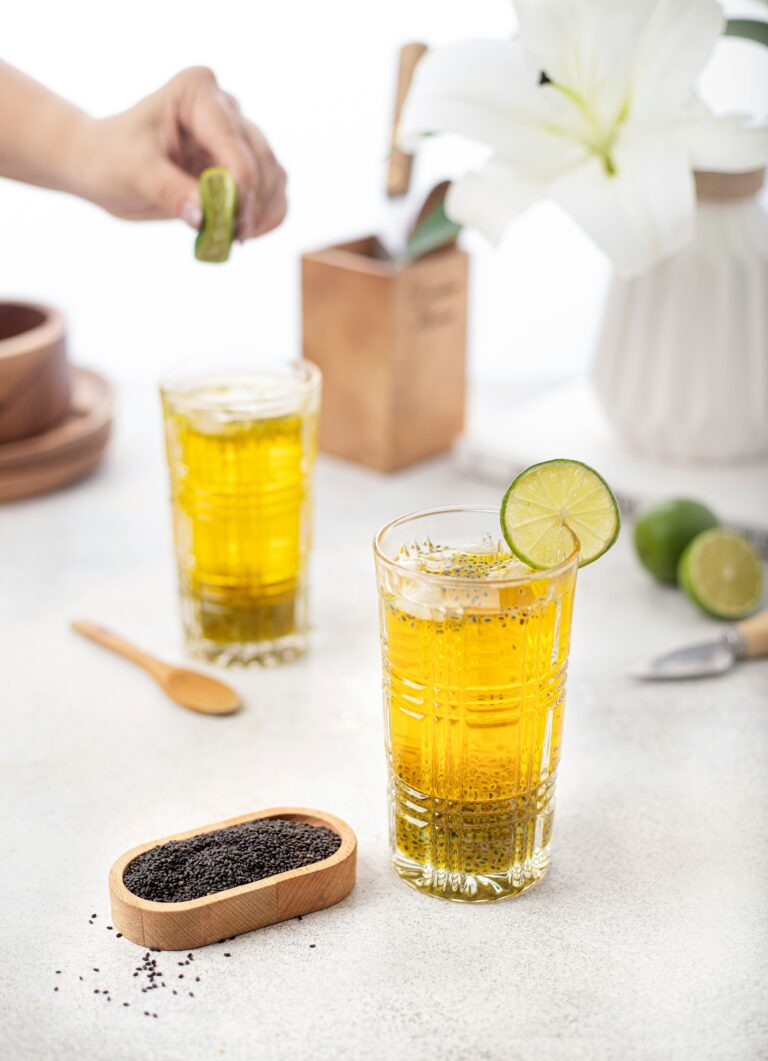 A refreshing glass of water with properly soaked basil seeds, demonstrating how to prepare them to avoid tukh malanga side effects.